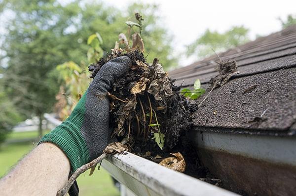 gutter cleaning requires specialized tools such as ladders, scoops, and pressure washers